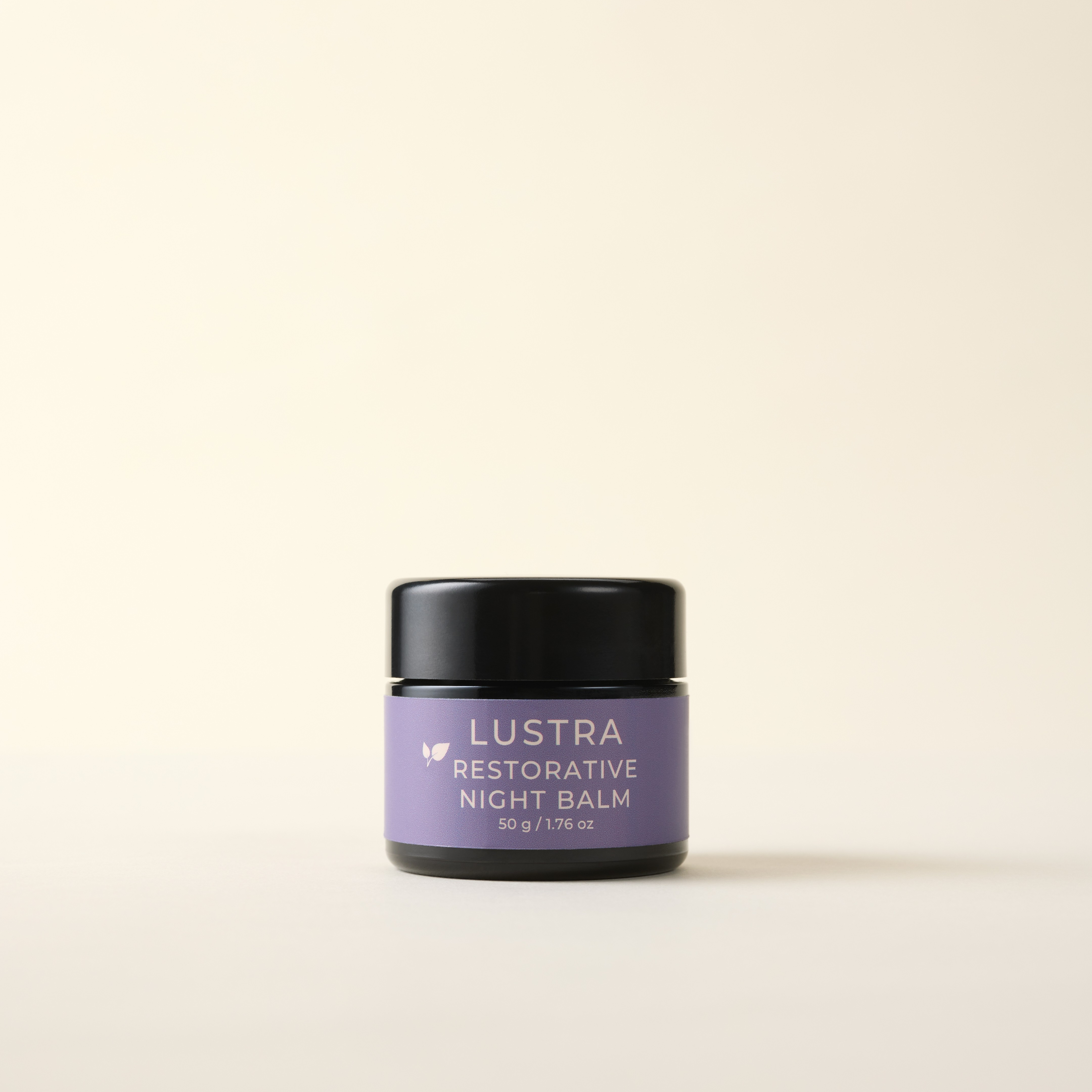 Lustra Restorative Night Balm jar on a beige background